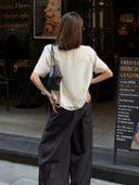 เสื้อท็อปเนื้อสัมผัสนุ่ม ชายเสื้อแต่งแผง (Z3433)